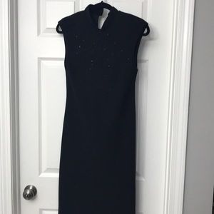 Oriental style black dress with bead accents